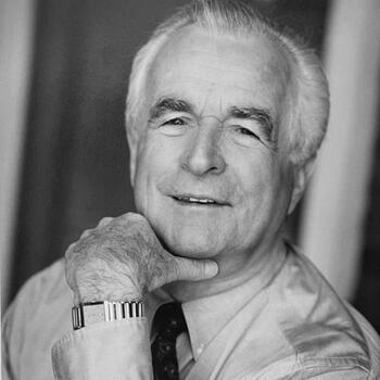 Black and white portrait of an elderly man.