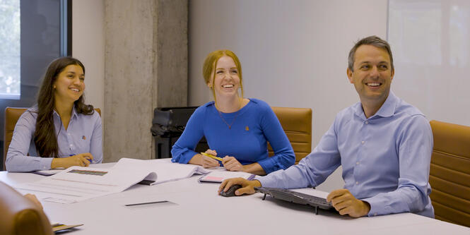 S+A staff in meeting room